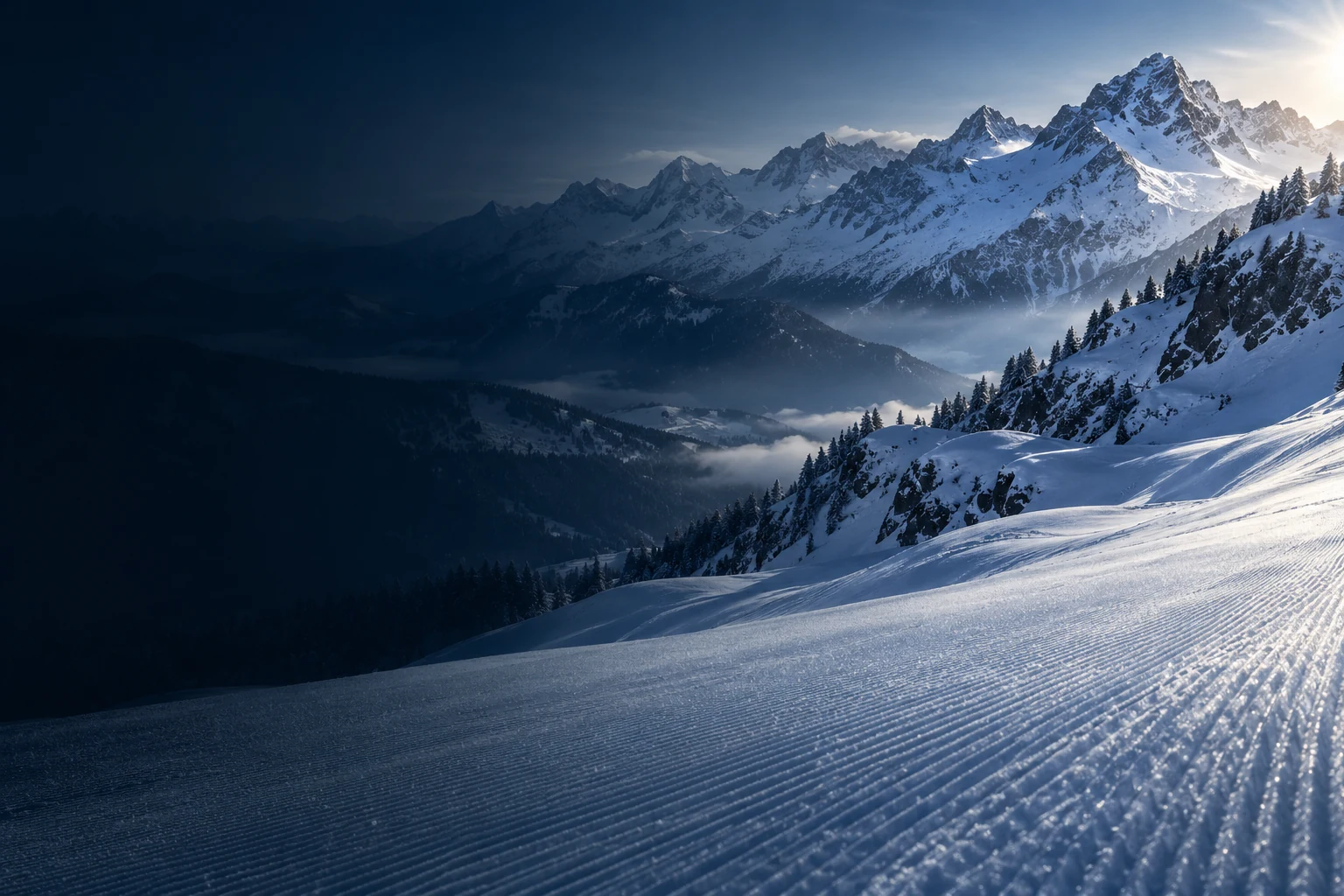 Snow-covered mountain peaks and an alpine landscape